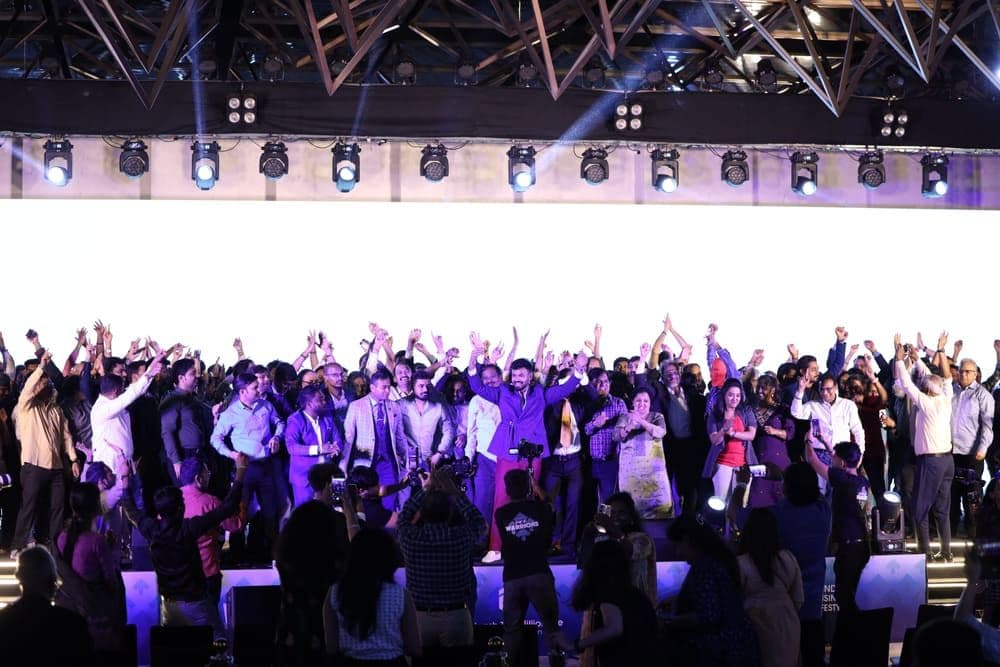 The crowd celebrating at a CoachEasily event